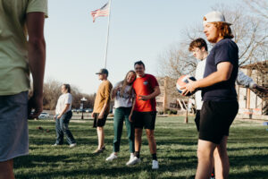 students playing outside on campus